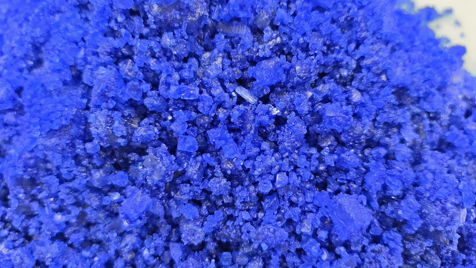 Close-up of blue OnePass treated salt crystals